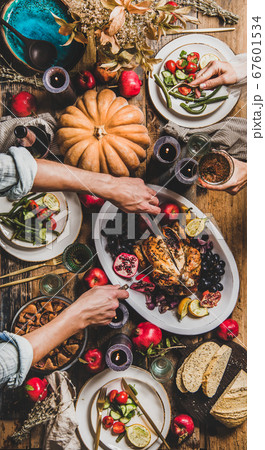 People eating and celebrating Thanksgiving day at People eating and celebrating Thanksgiving day at 67601534