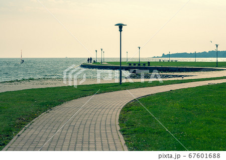 A winding footpath along the coast in Neringa 67601688
