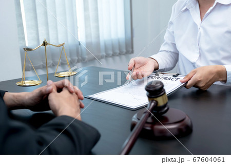 The male lawyer is providing service to consult 67604061