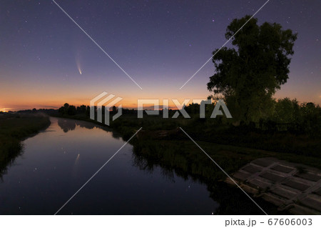 Comet Neowise C/2020 F3 at sunet over the river. 67606003