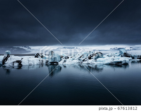 Jokulsarlon glacier lagoon, Vatnajokull national park, Iceland. Ocean bay and icebergs. Jokulsarlon glacier lagoon, Vatnajokull national park, Iceland. Ocean bay and icebergs. 67613812