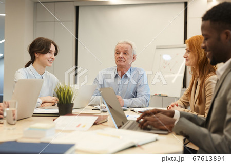 Senior Boss Meeting with Young Employees Senior Boss Meeting with Young Employees 67613894