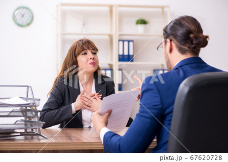 Business meeting between businessman and businesswoman Business meeting between businessman and businesswoman 67620728