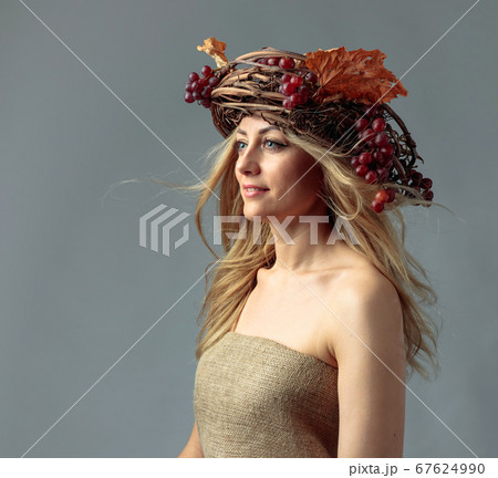 Portrait of a beautiful caucasian blonde with hair Portrait of a beautiful caucasian blonde with hair 67624990