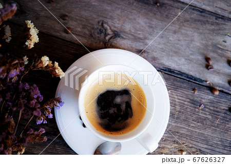 Black coffee on wooden. 67626327