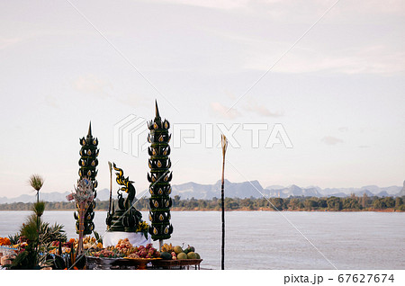 Naga Altar prayer place by Mae Khong river - 67627674