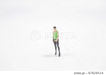 a fun of scale human figure on the board 67629514