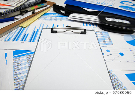 business office desk closeup - financial reports, business office desk closeup - financial reports, 67630066
