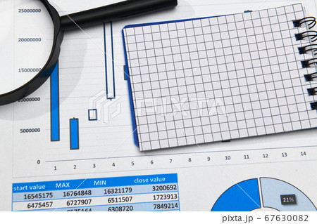 business office desk closeup - financial reports, 67630082
