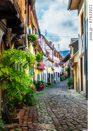 Traditional french houses and shops in Eguisheim, 67633021