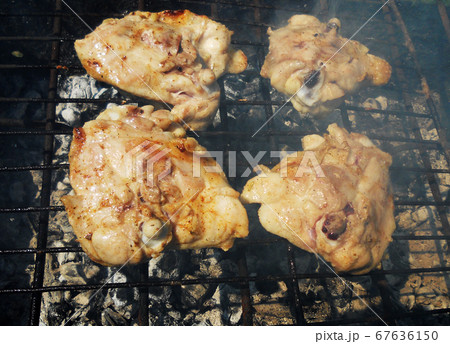 grilled chicken meat on the grill ready for eating 67636150