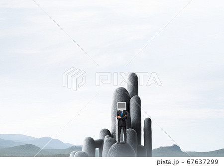 Businessman with monitor instead of head. 67637299
