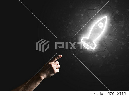 Man palm presenting Rocket web icon as technology concept Man palm presenting Rocket web icon as technology concept 67640556