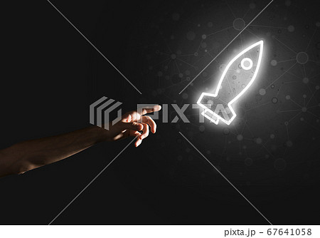 Man palm presenting Rocket web icon as technology concept Man palm presenting Rocket web icon as technology concept 67641058