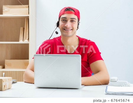 Call center worker at parcel distribution center in post office Call center worker at parcel distribution center in post office 67645674