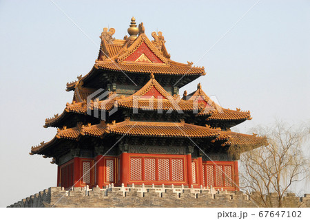 Forbidden City, Beijing, China. A corner tower seen from outside the Forbidden City. The Forbidden City has traditional Chinese architecture. The Forbidden City is also the Palace Museum, Beijing. 67647102