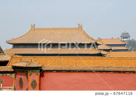 Forbidden City, Beijing, China. Red walls and yellow roofs of the Forbidden City. The Forbidden City has traditional Chinese architecture. The Forbidden City is also the Palace Museum, Beijing, China. 67647116