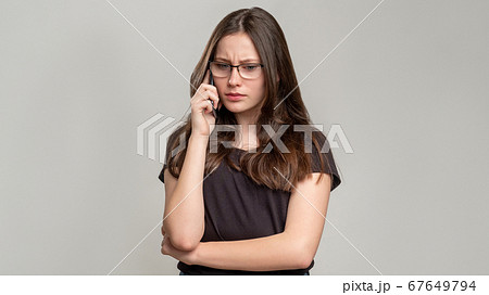 disturbing call distant conflict troubled woman 67649794