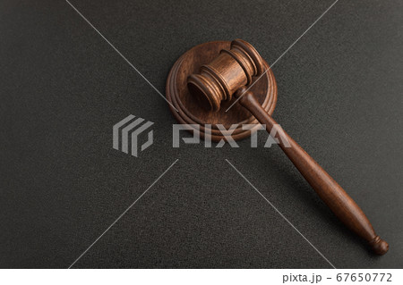 Judges gavel or hammer for auction on black Judges gavel or hammer for auction on black 67650772