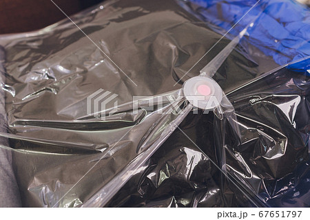 Space saver saving seal bag sucking air out , vacuum clothing storage compressed package. 67651797