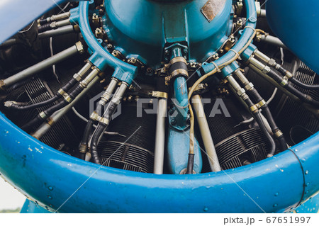 Close up view of a vintage propeller passenger and cargo airplane. Close up view of a vintage propeller passenger and cargo airplane. 67651997
