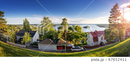 Pispala area in Tampere, Finland on beautiful sunny evening with view to lake Pyhajarvi Pispala area in Tampere, Finland on beautiful sunny evening with view to lake Pyhajarvi 67652411