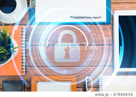 Business workplace with tablet pc and security concept on screen 67660039