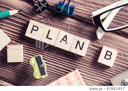 Conceptual business keywords on table with elements of game making crossword Conceptual business keywords on table with elements of game making crossword 67661937