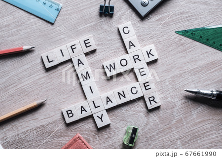 Words work life balance and family on table collected with wooden elements Words work life balance and family on table collected with wooden elements 67661990