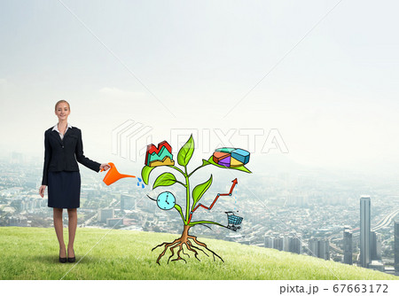 Young businesswoman outdoors watering drawn growth concept with can 67663172