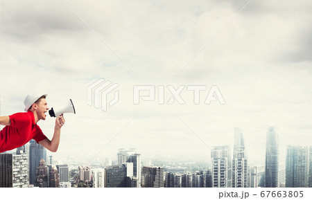 Guy screaming in loudspeaker 67663805