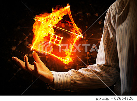House fire icon in palm House fire icon in palm 67664226