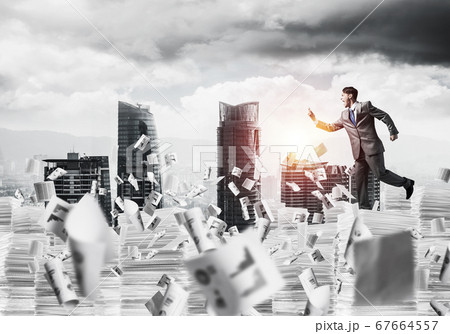 Precise businessman in suit running with phone. 67664557