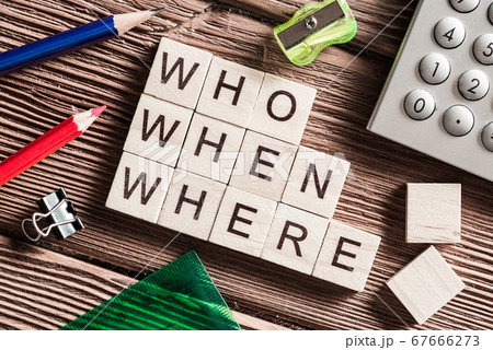Conceptual business keywords on table with elements of game making crossword 67666273