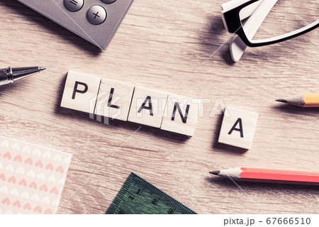 Conceptual business keywords on table with elements of game making crossword Conceptual business keywords on table with elements of game making crossword 67666510