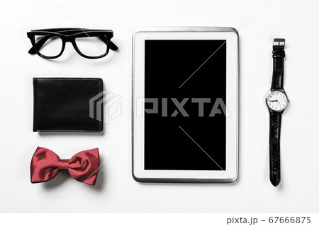 Gentleman kit of tablet watch glasses bow tie and notebook on wo 67666875