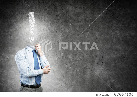 Pensive headless businessman Pensive headless businessman 67667100