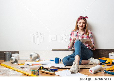 Beautiful girl using laptop computer at home Beautiful girl using laptop computer at home 67667843