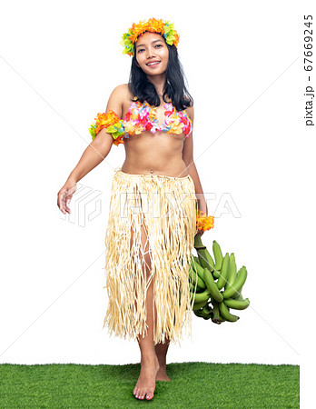 Hawaii Hula Dancer carries bunch of green bananas, Hawaii Hula Dancer carries bunch of green bananas, 67669245