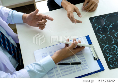 The doctor hold the tablet The doctor hold the tablet 67676642
