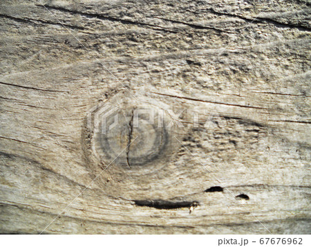 Background texture brown wood, closeup fracture 67676962