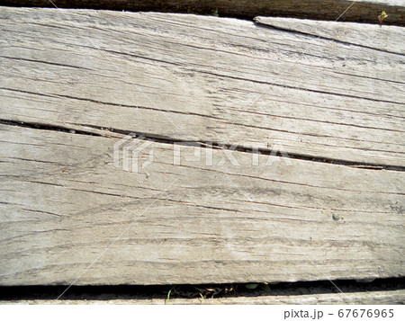 Background texture brown wood, closeup fracture 67676965