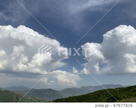 white clouds in the sky right before the storm white clouds in the sky right before the storm 67677816