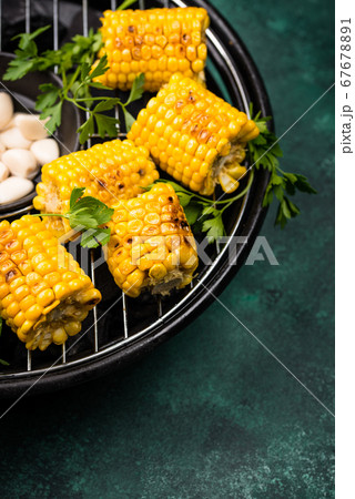 Grilled corn. Summer vegan food Grilled corn. Summer vegan food 67678891