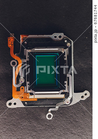 Matrix from a SLR camera on a dark background, macrophotography. Matrix from a SLR camera on a dark background, macrophotography. 67681744