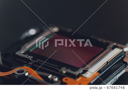 Matrix from a SLR camera on a dark background, macrophotography. 67681748