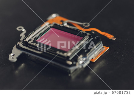 Matrix from a SLR camera on a dark background, macrophotography. 67681752