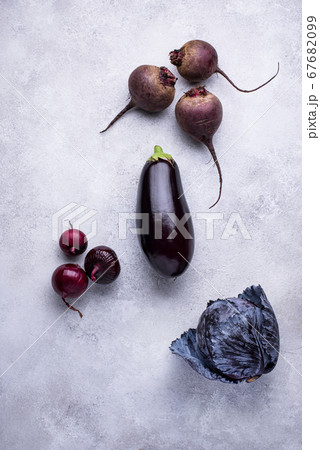 Assortment of raw purple vegetables Assortment of raw purple vegetables 67682099