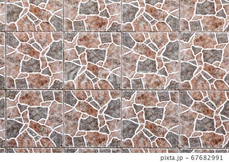 Wall tiled with giraffe skin pattern. Wall tiled with giraffe skin pattern. 67682991