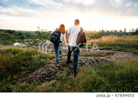 Home Country Traveling, domestic travel. Local travel, Solo Explorers, Small Group tourist. Young couple going for hiking, walk in nature. 67684603